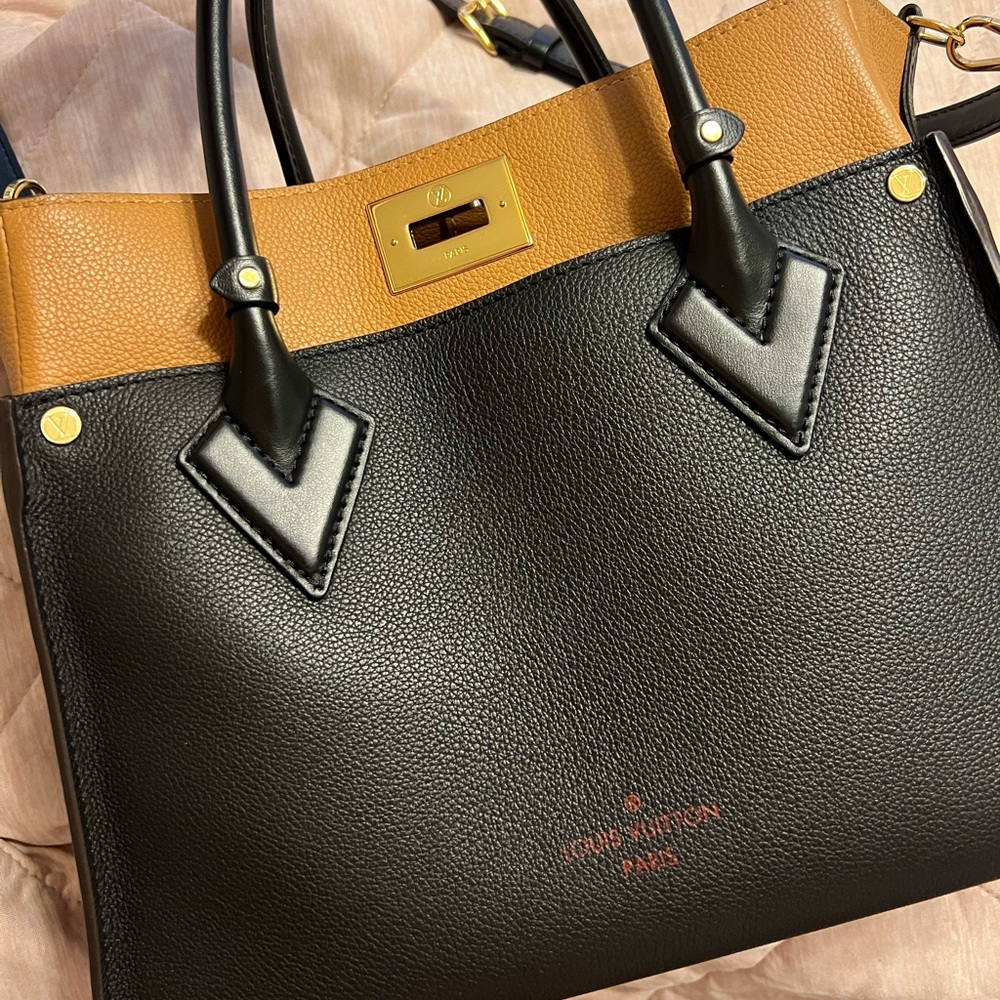 Louis Vuitton On My Side - barely used. Box & dust cover included.